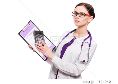 Young beautiful female doctor holding clipboard Young beautiful female doctor holding clipboard 39404011