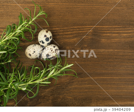Quail Eggs on Wooden Background 39404209