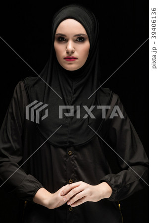 Beautiful young muslim woman wearing black hijab 39406136