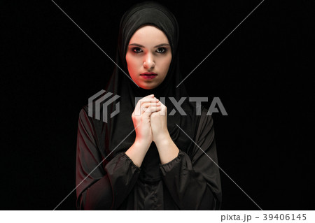Portrait of beautiful young muslim woman wearing Portrait of beautiful young muslim woman wearing 39406145