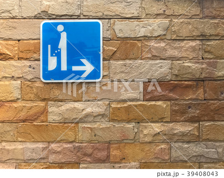WC or toilet sign on brick wall 39408043