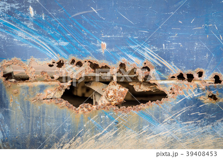 Hole chipped rusty textured metal of old car 39408453