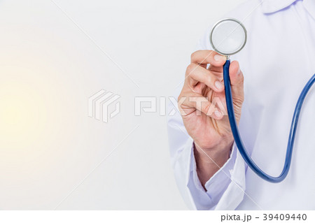 Hand of medical doctor and stethoscope. 39409440