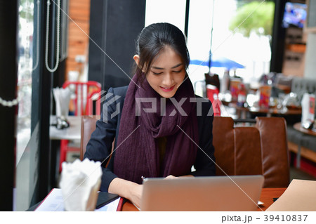 Business Concept.Young Asian businesswoman is working happily.Yo Business Concept.Young Asian businesswoman is working happily.Yo 39410837