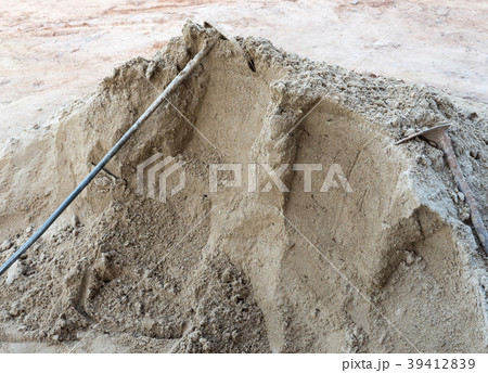 Old metal spade on the sand pile. Old metal spade on the sand pile. 39412839