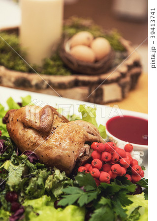 quail roasted with sweet and sour cranberry sauce quail roasted with sweet and sour cranberry sauce 39413741