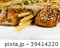 white bread with spikelets of wheat, oats and rye 39414220