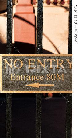 in the background the sign of  entrance 39414471