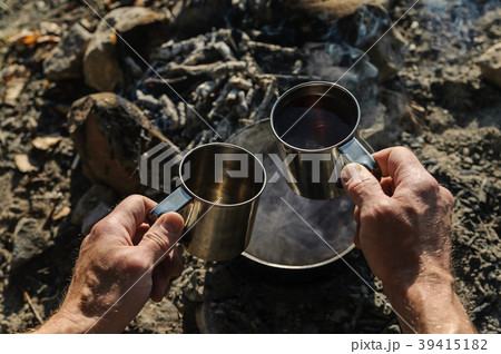 Two metal mugs. 39415182