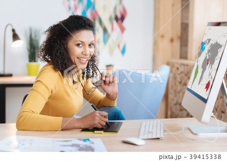 Inspired successful freelancer working on her Inspired successful freelancer working on her 39415338
