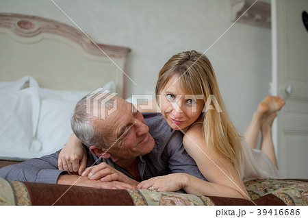 Indoors Portrait of Joyful Couple with Age 39416686
