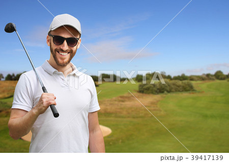 Golfer with golf club 39417139