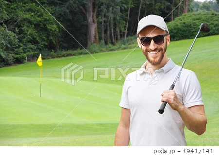 Golfer with golf club 39417141
