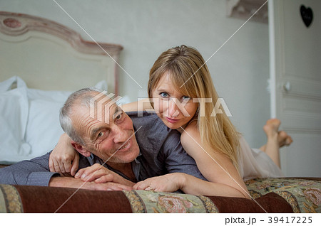 Indoors Portrait of Couple with Age Difference Indoors Portrait of Couple with Age Difference 39417225