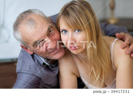 Closeup Portrait of Smiling Couple with Age Closeup Portrait of Smiling Couple with Age 39417231
