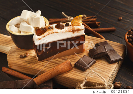 Various sweet treats: cakes and chocolate bars on 39421854