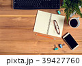 top view desk wood and office equipment 39427760