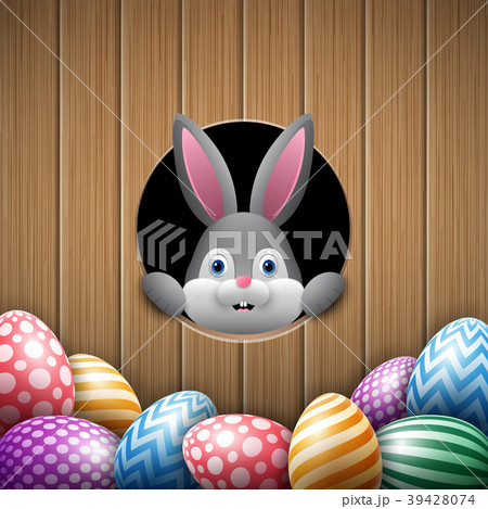 Cute Easter bunny peeking out of a hole with color Cute Easter bunny peeking out of a hole with color 39428074