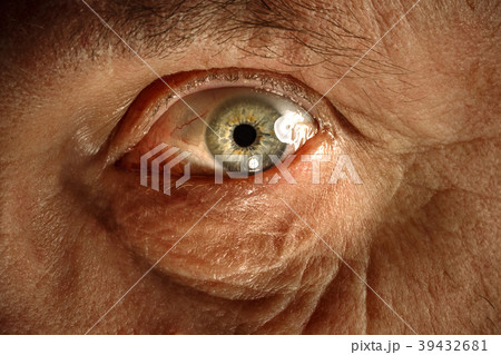 Close-up view on the eye of senior man. Close-up view on the eye of senior man. 39432681