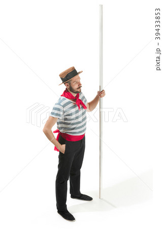 Caucasian man in traditional gondolier costume and Caucasian man in traditional gondolier costume and 39433853