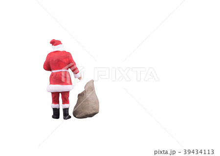 Close up of Miniature Santa Claus and gifts bag 39434113