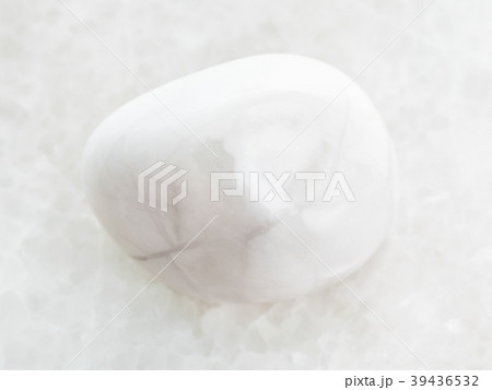 polished magnesite gemstone on white marble 39436532
