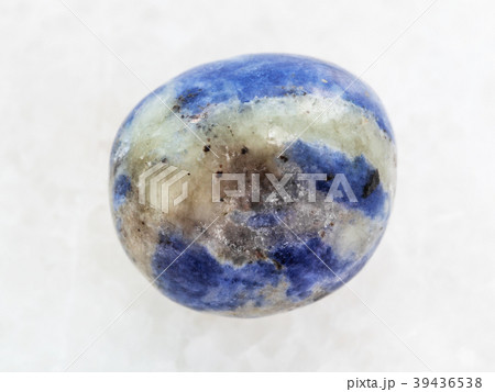 polished Sodalite gem stone on white marble 39436538