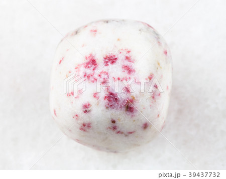 cinnabar in tumbled white dolomite stone on white 39437732