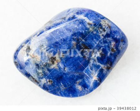 tumbled Sodalite gemstone on white marble 39438012