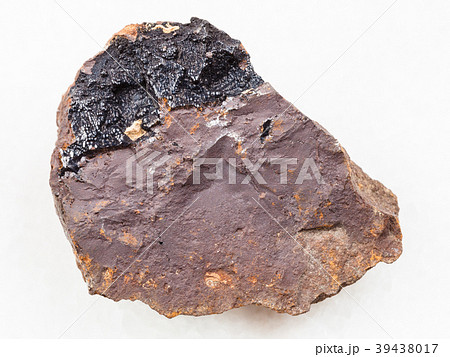 goethite aggregates on limonite stone on white 39438017