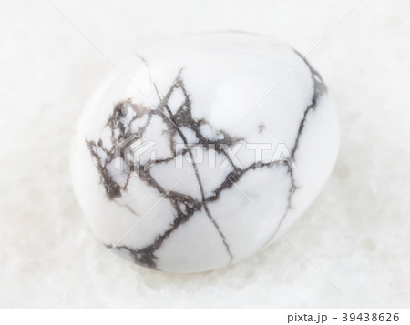 tumbled howlite gemstone on white 39438626