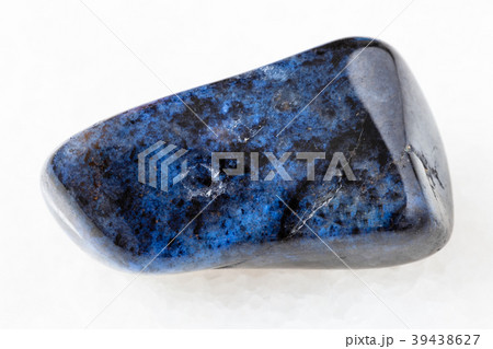 tumbled dumortierite gem on white 39438627
