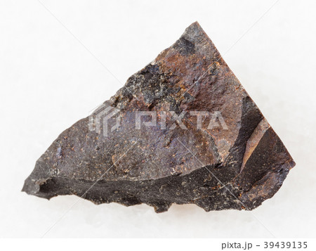 rough tagamite stone on white 39439135