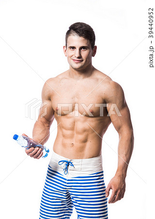 Young strong athlete on light background looking 39440952
