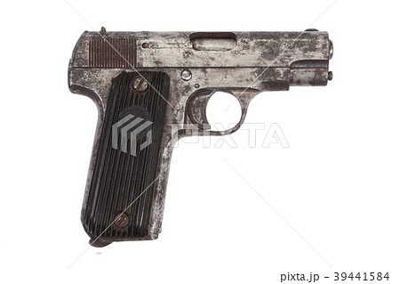 Old rusty handgun on white 39441584