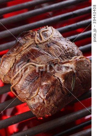 Meat on red-hot grill. Close up Meat on red-hot grill. Close up 39443408