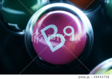 Vitamin B9, on black background. Symbol of health 39443738