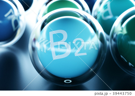 Vitamin B2, on black background. Symbol of health Vitamin B2, on black background. Symbol of health 39443750