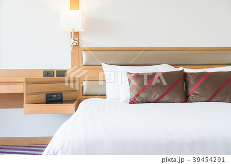 Comfortable pillow on bed Comfortable pillow on bed 39454291