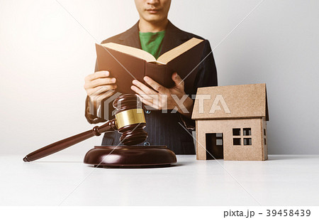 Real estate insurance lawyer working hard. 39458439