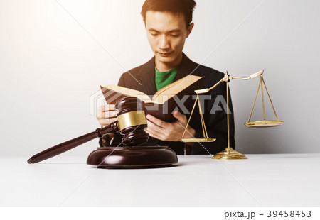 Real estate insurance lawyer working hard. Real estate insurance lawyer working hard. 39458453