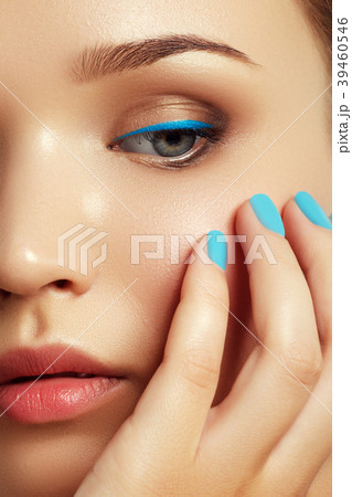Cosmetics and makeup. Woman's face with vivid make 39460546