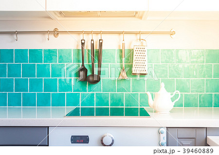 Modern gray kitchen features dark gray flat front Modern gray kitchen features dark gray flat front 39460889