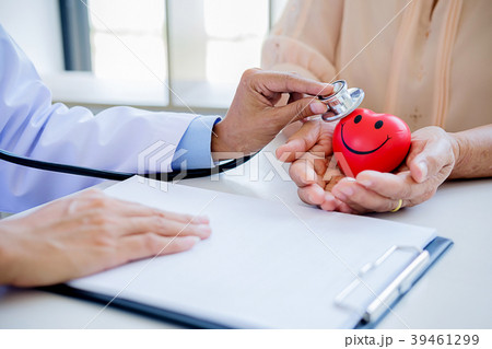 Patient listening intently to a male doctor  39461299