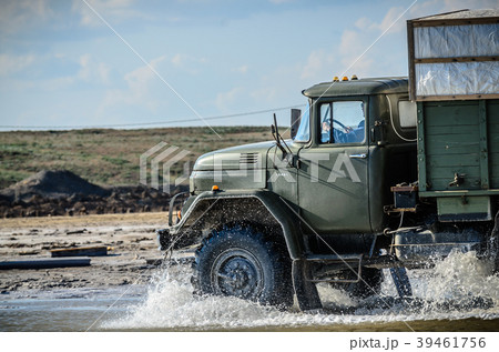 Off-road truck whith wheels tires in mud and water 39461756