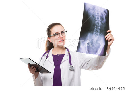 Attractive young woman doctor with tablet in her 39464496