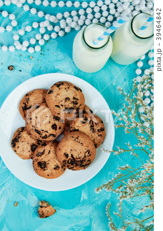 Cookie chocolate with a milk bottles.  39464842