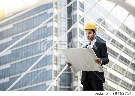 engineer hand holding construction drawing engineer hand holding construction drawing 39465714