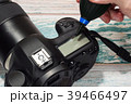 Cleaning professional digital camera body concept 39466497