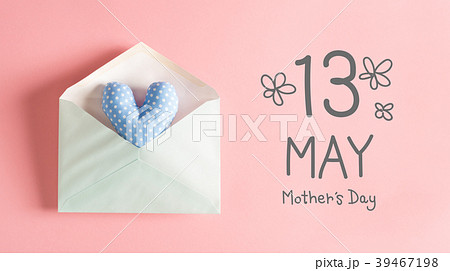 Mother's Day message with a blue heart cushion 39467198